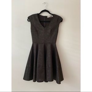 Little black dress with subtle floral pattern